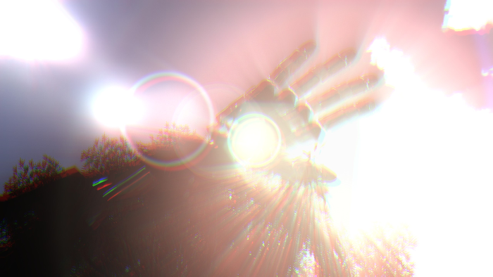 A robotic hand held up against the sun, from the opening of The Talos Principle